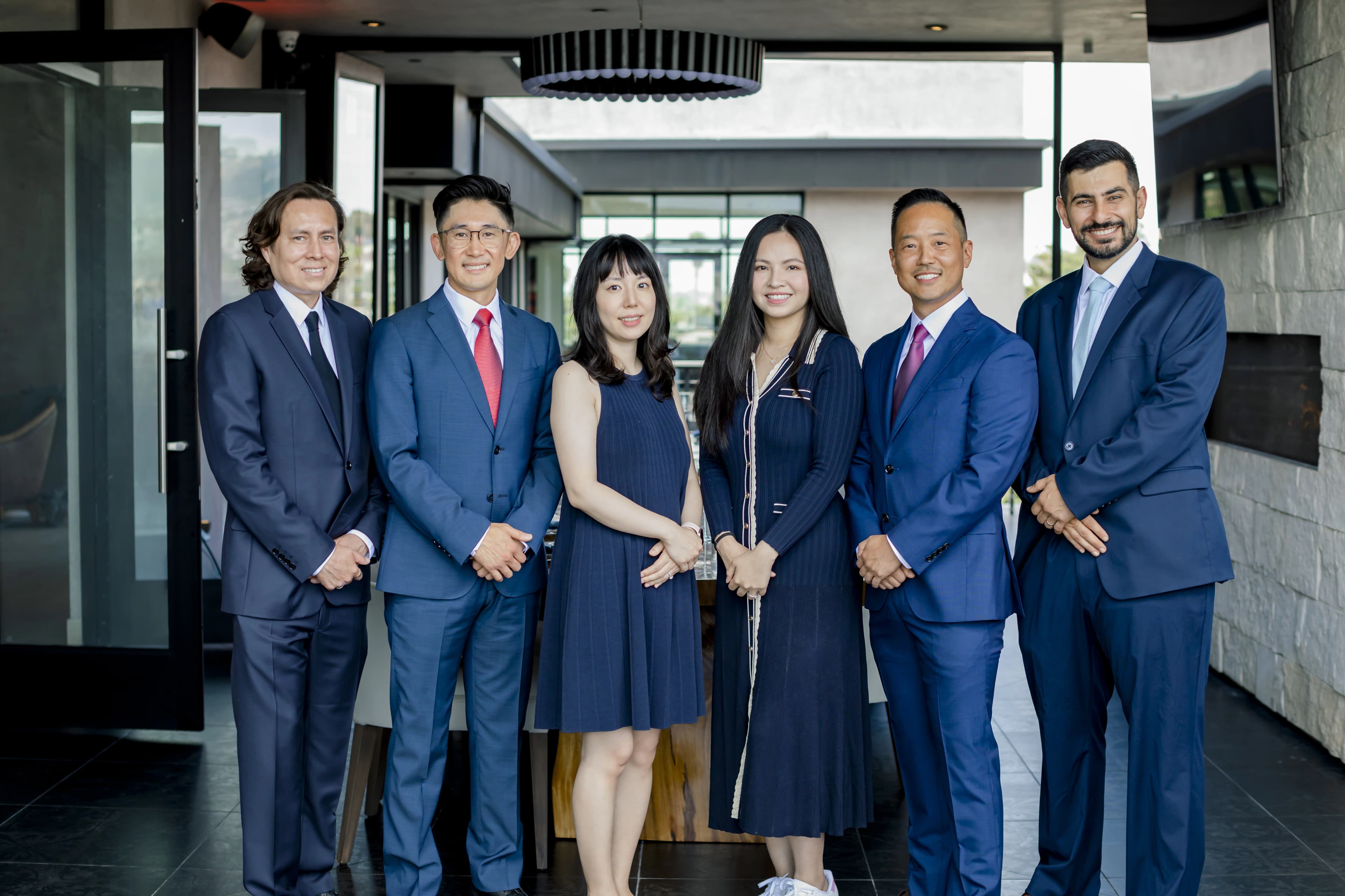 Team members at Elite Sedation working collaboratively